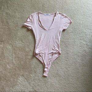 MOD boutique brand body suite.